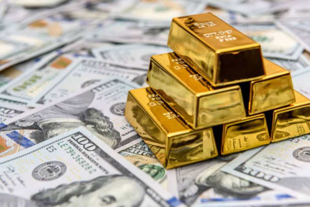dollar and gold